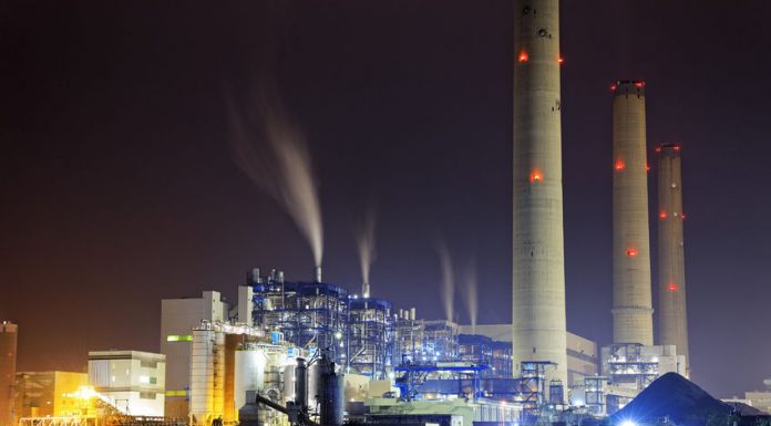 power station at night with smoke, hong kong