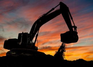 An excavator working on the mining investment